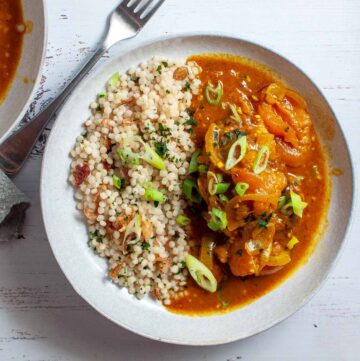Apricot chicken curry with rice in a bowl