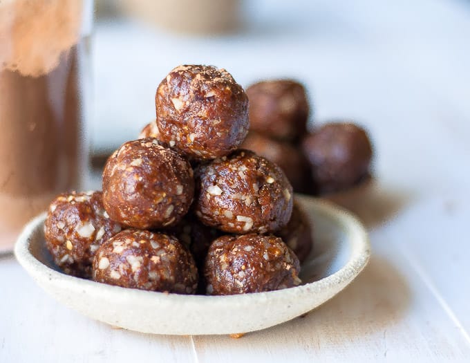 Low calorie energy balls stacked high in a bowl