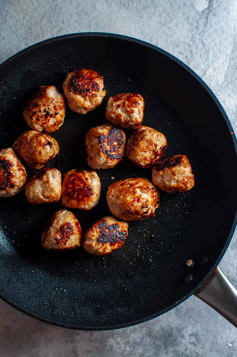 Thai chicken meatballs in a pan