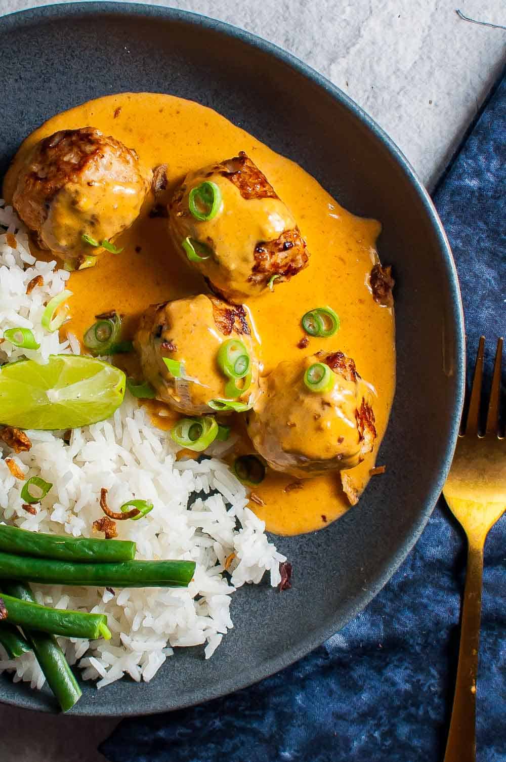 Thai Chicken Meatballs With Peanut Sauce with rice and beans