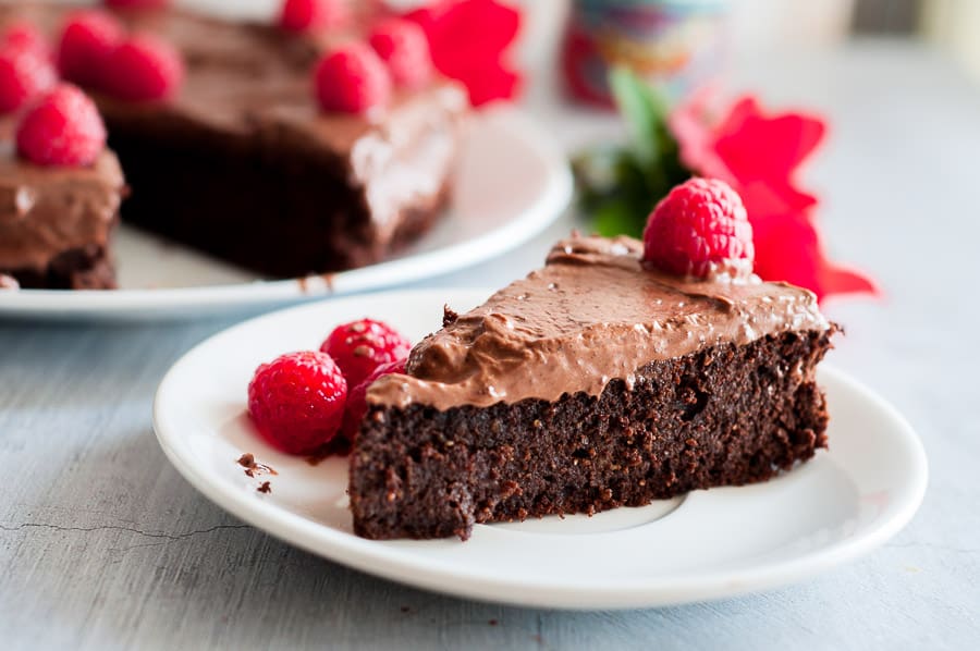 Close up gluten free mud cake on a white plate