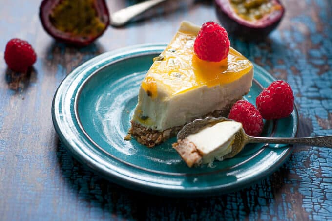 a single slice of no bake passionfruit cheesecake