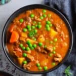 lamb stew in a black bowl