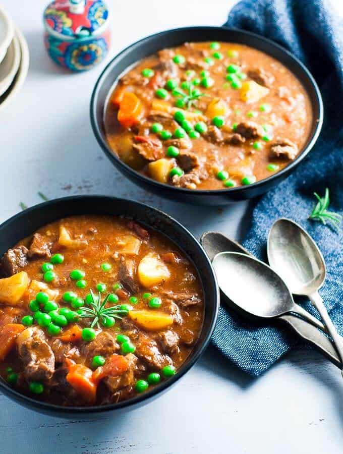 pressure cooker lamb stew in two bowls side angle