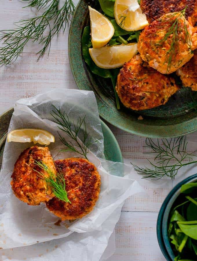 2 plates of salmon fritters with lemon 