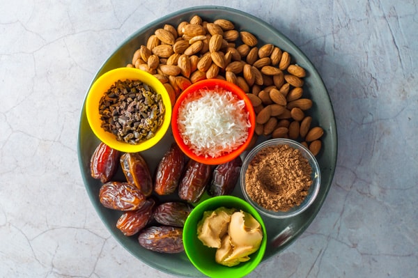 Cacao Bliss Balls ingredients on a plate