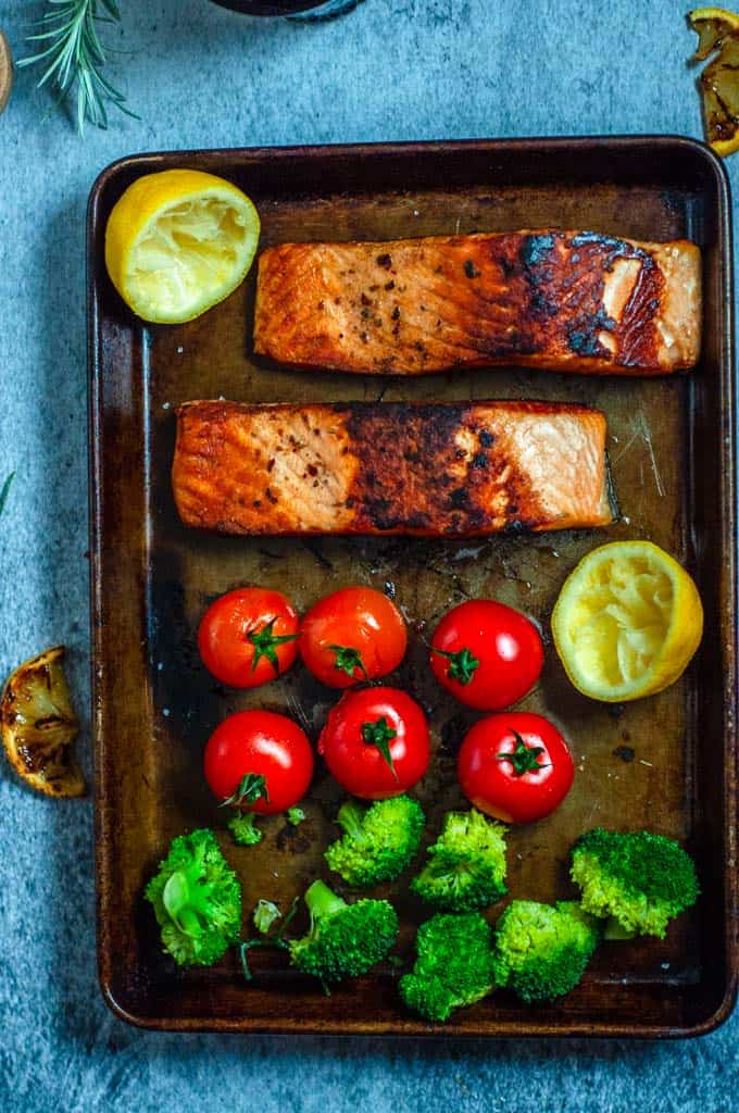 Cooked salmon and veges in baking tray