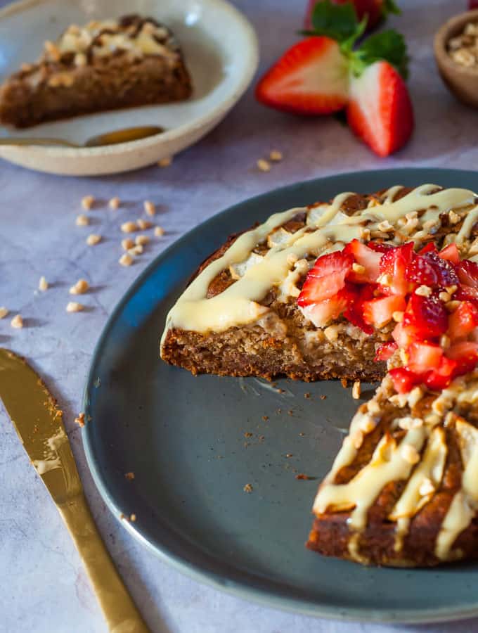 healthy sticky date pudding on a grey plate
