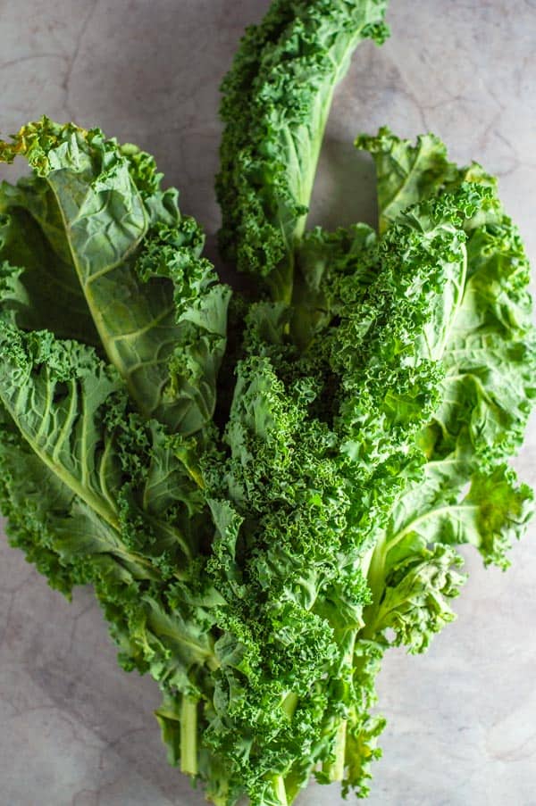 a bunch of kale on a bench