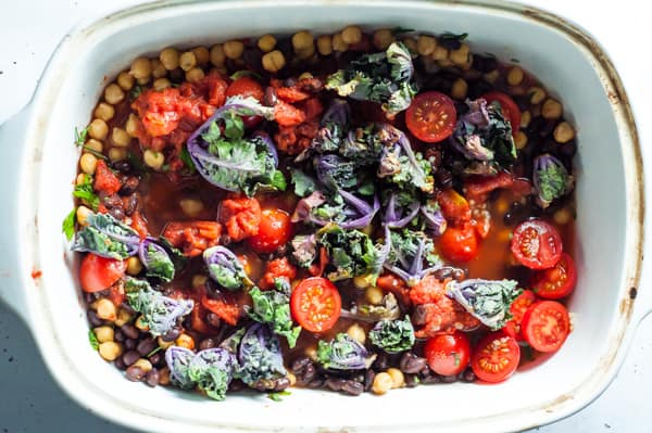 casserole dish with kale and tomatoes