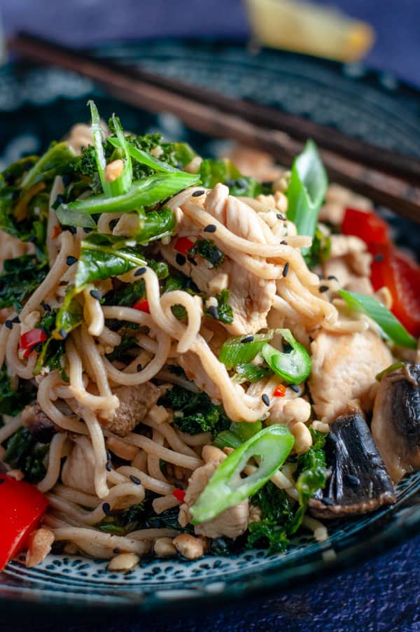 Chicken and kale stirfry with noodles in a bowl