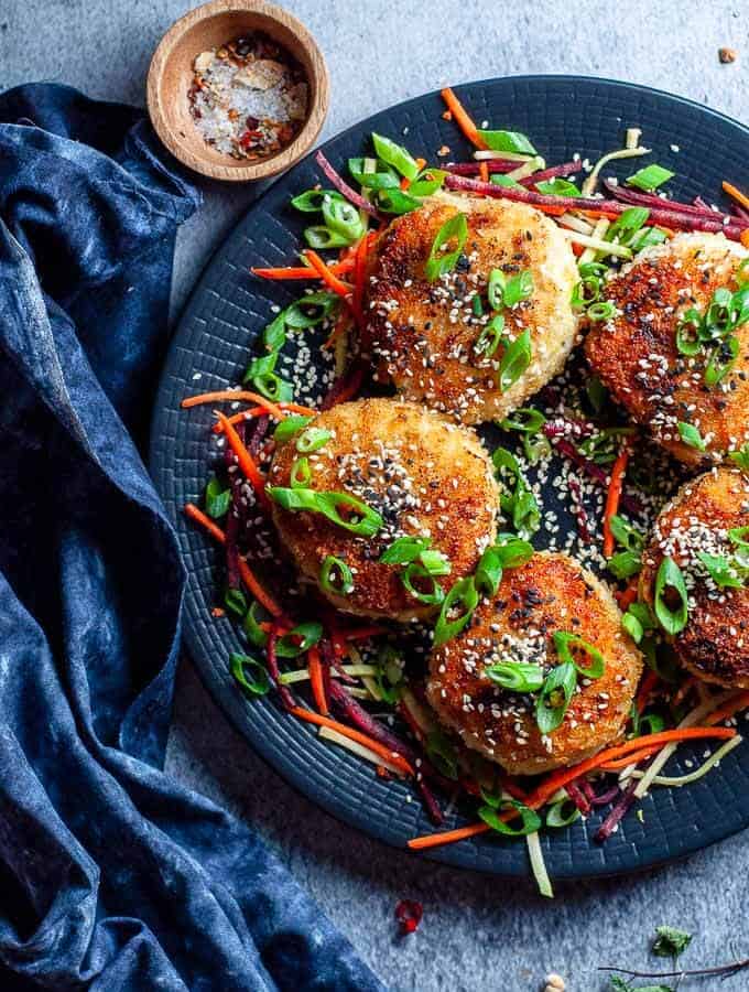 chicken rissoles on a black plate