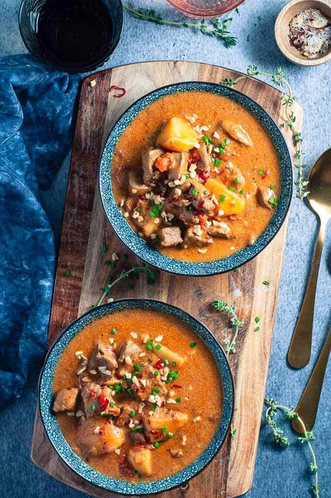 Two bowls of beef rendang pressure cooker