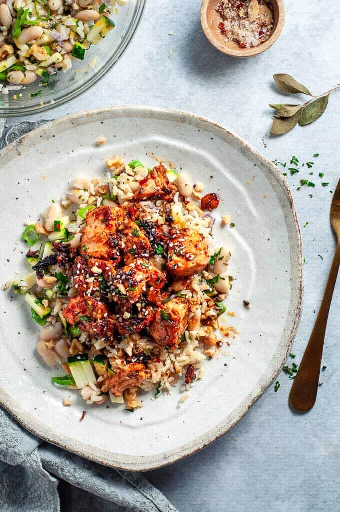 Healthy Asian Salmon salad on a beige plate