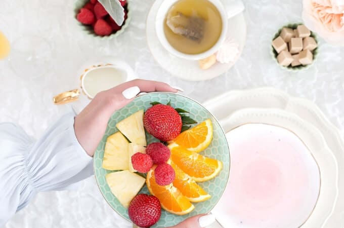 clean eating fruits in a green bowl