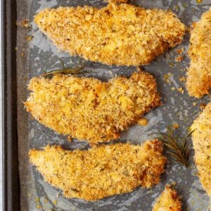 crispy chicken fingers in panko on baking tray