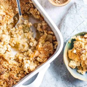 apple crumble in a white rectangle dish