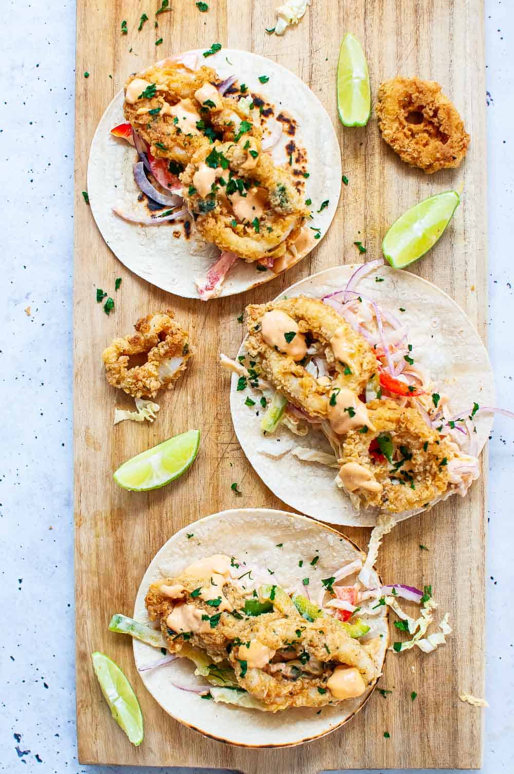 Calamari tacos on a board