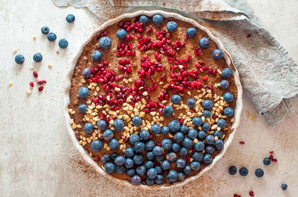 no bake chocolate tart with berries and nuts