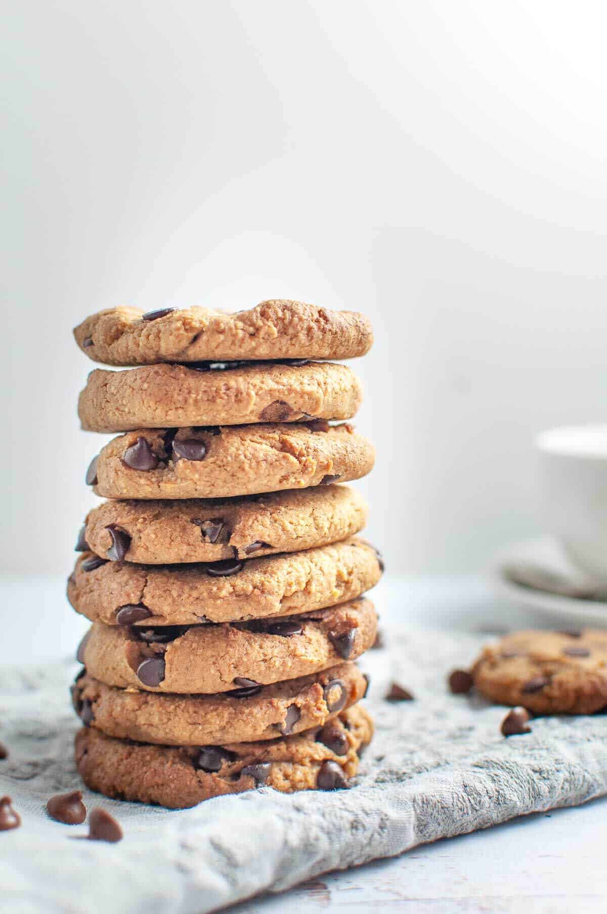Chickpea Chocolate Chip Cookies stacked on a napkin
