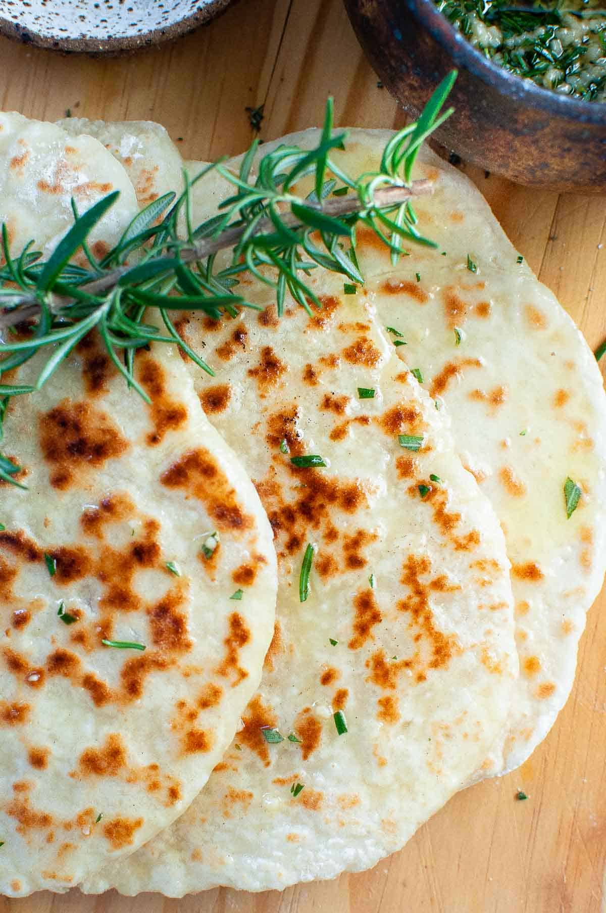 3 flatbreads with oil and rosemary