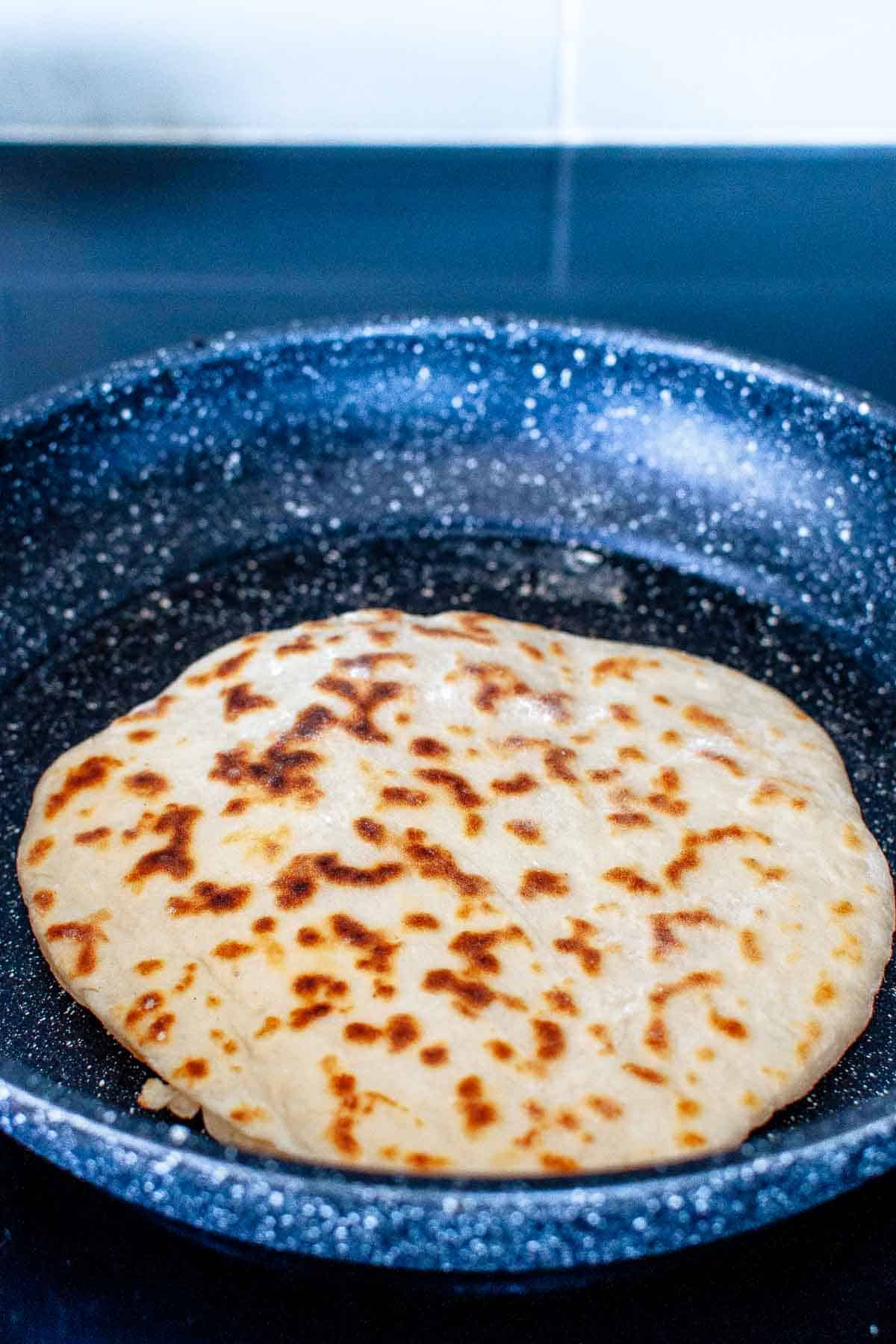 Cooking healthy flatbread in a pan