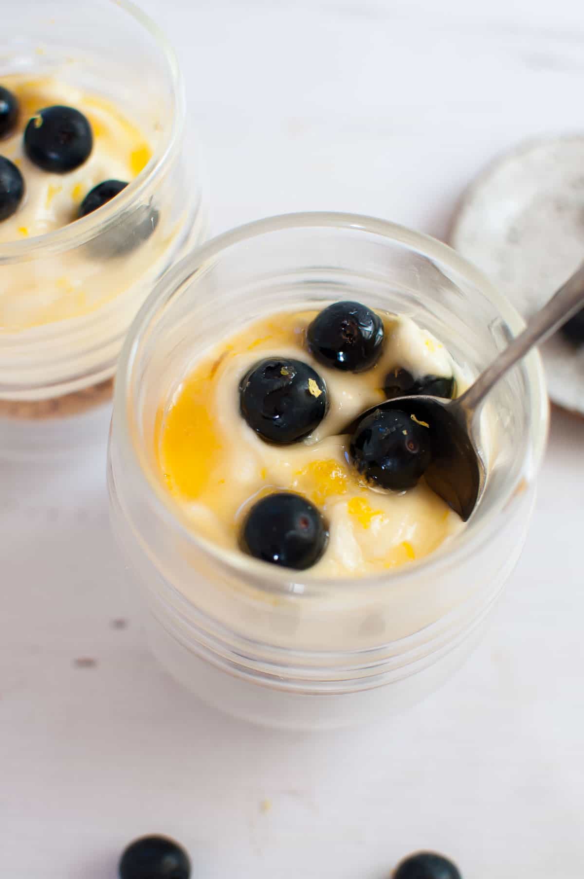 Dessert cups with a spoon in ready to eat