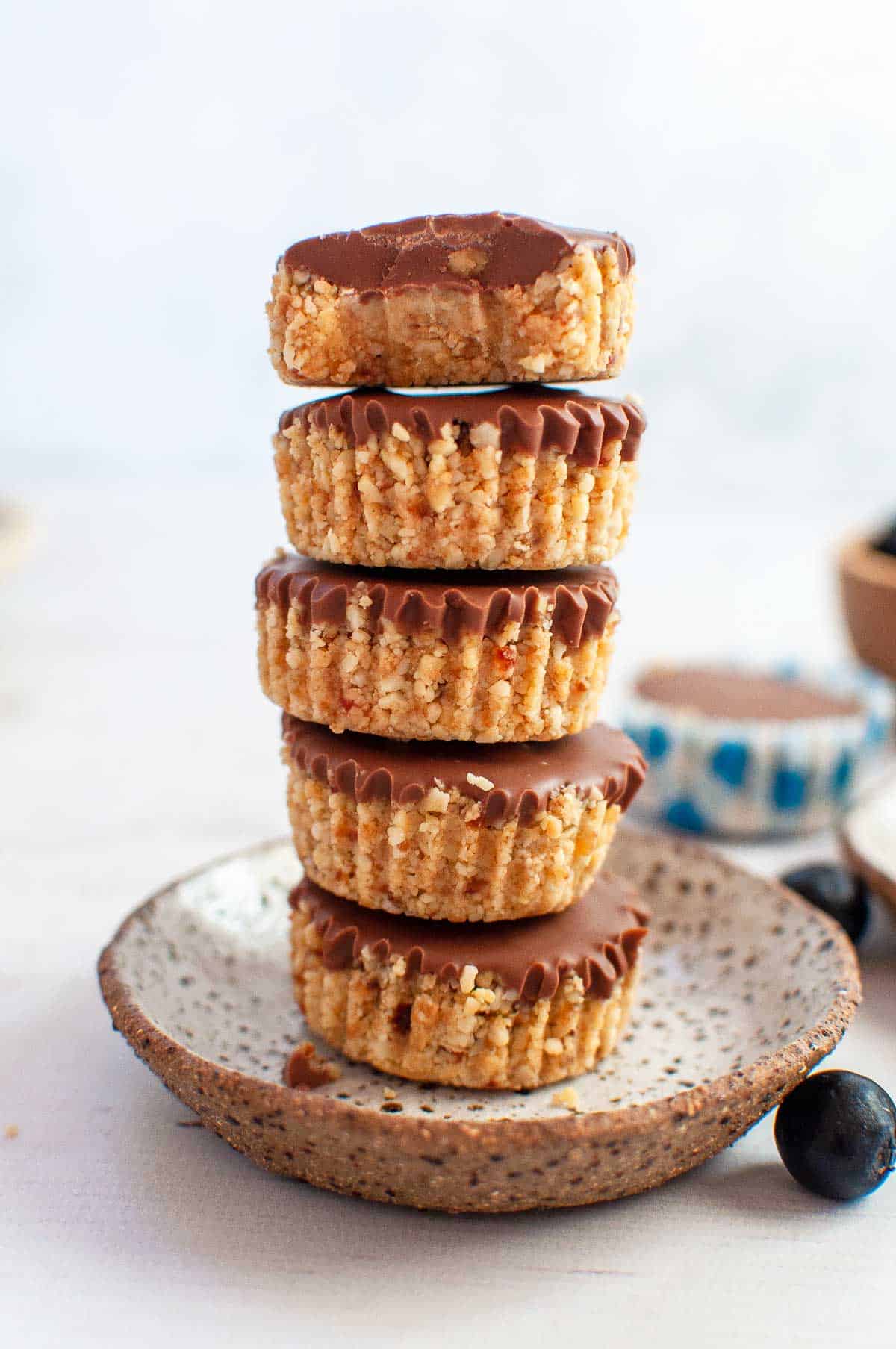 a stack of 5 peanut butter cups on a plate