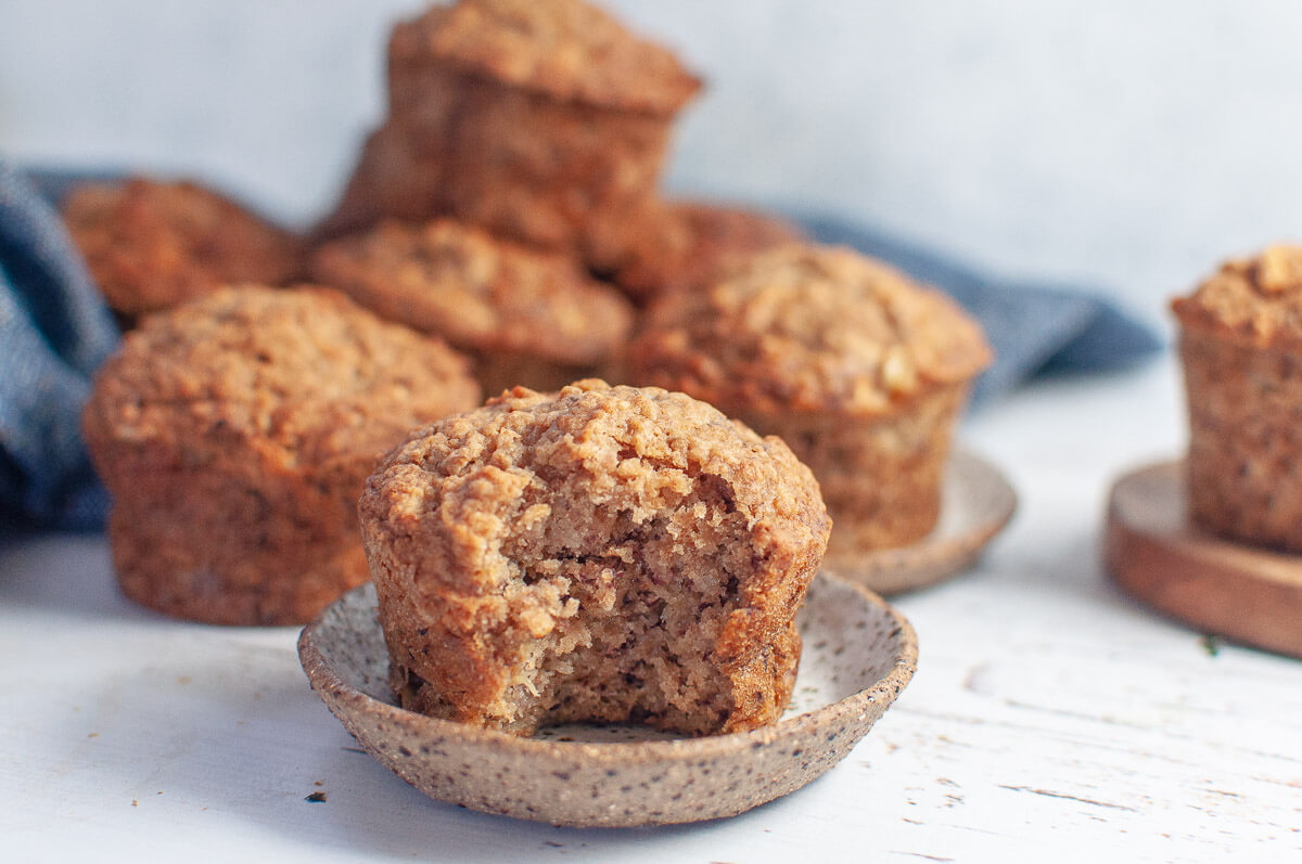 an apple muffin with a bite taken out