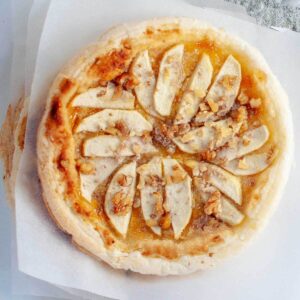 apple puff pastry tart on baking paper