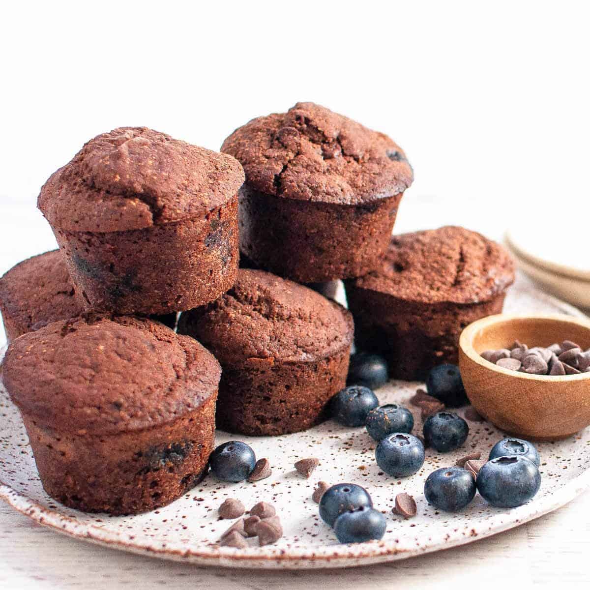 Chocolate blueberry muffins on a plate