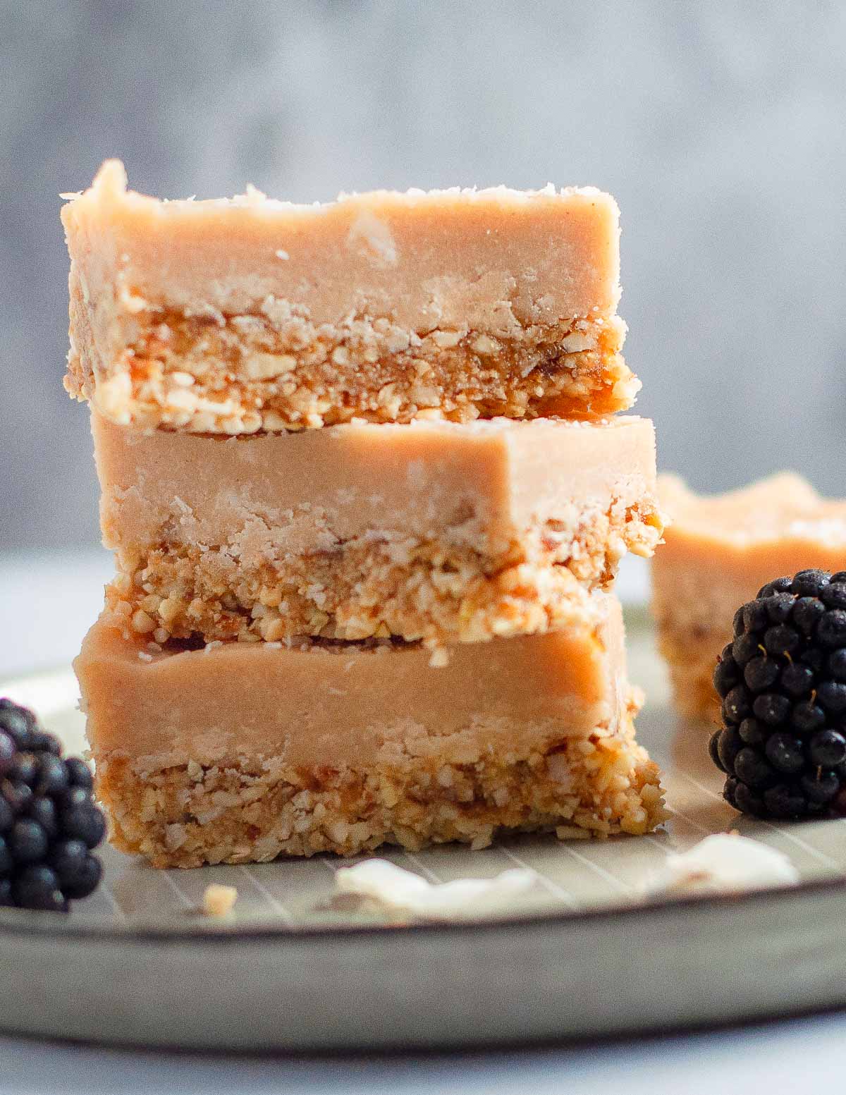 a stack of 3 ginger slice pieces on a plate