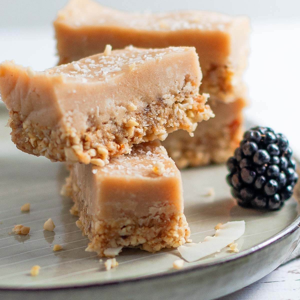 two pieces of ginger slice on top of each other on a plate