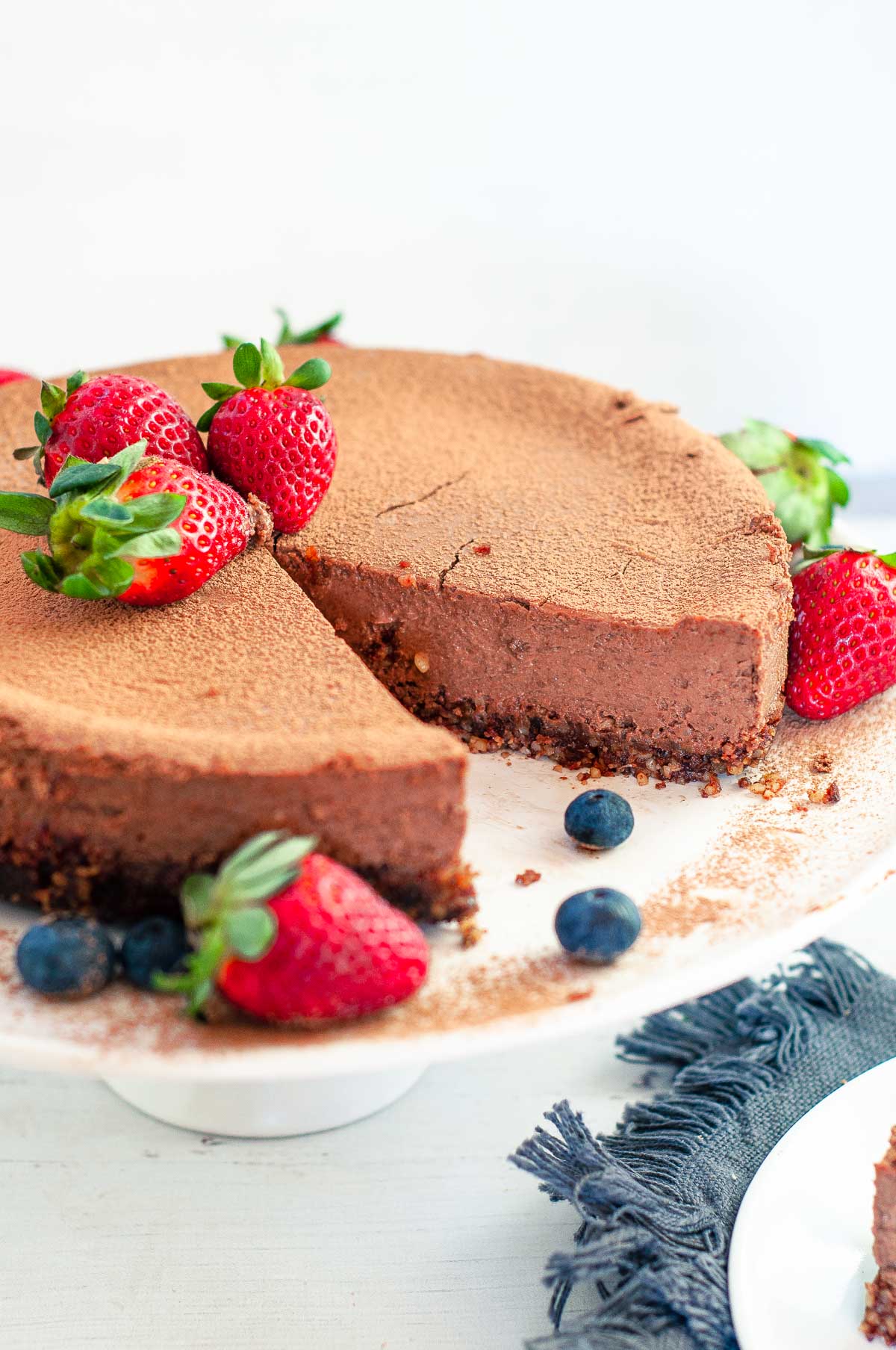 chocolate ricotta cheesecake on a serving platter