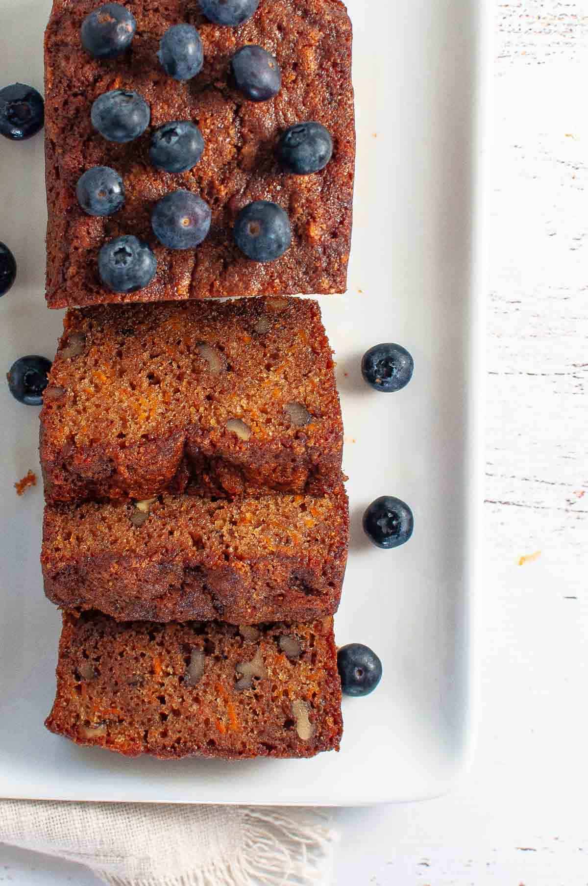 Ginger date loaf slices on a plate