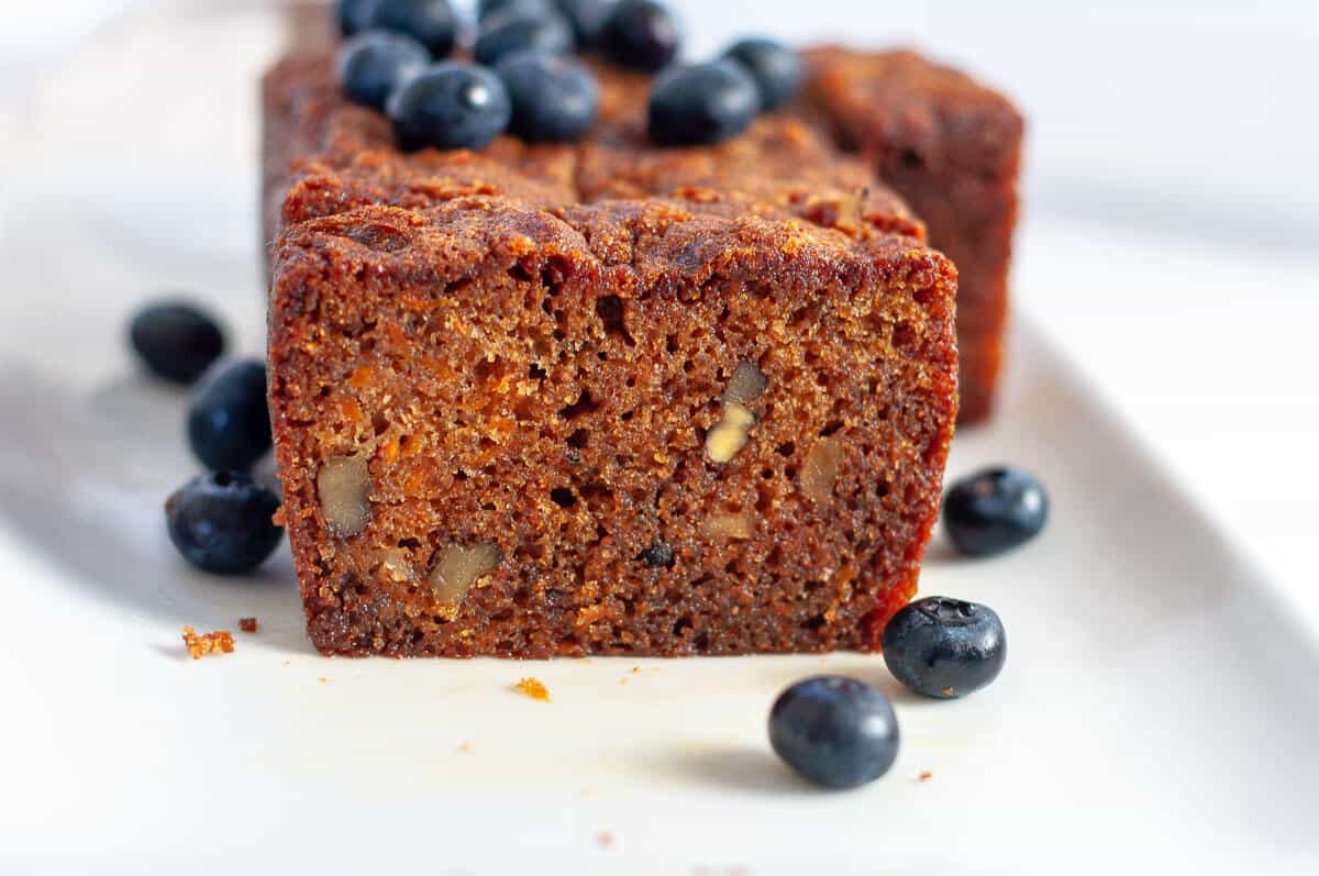 A slice of ginger loaf cake on a plate