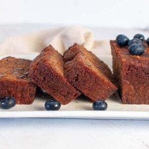 Ginger loaf cake sliced on a serving tray