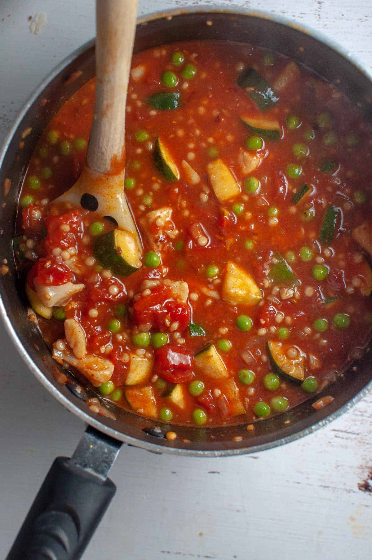 Adding fish to the fish stew