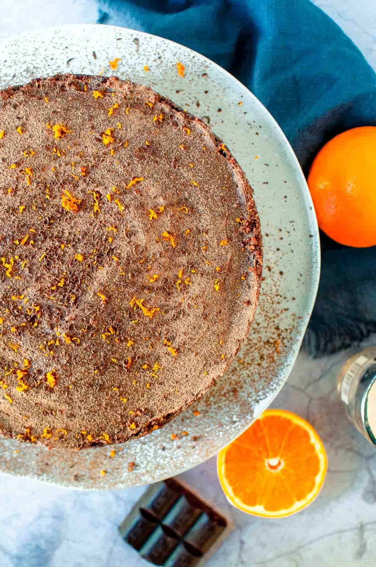 chocolate orange cheesecake on a serving platter