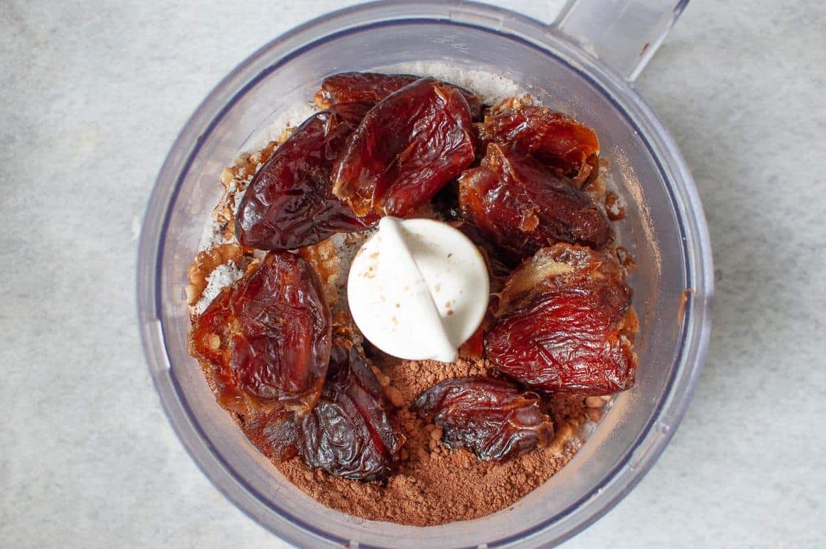 ingredients for chocolate slice base in a food processor