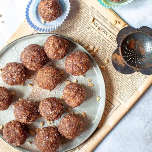 bliss balls scattered on a plate