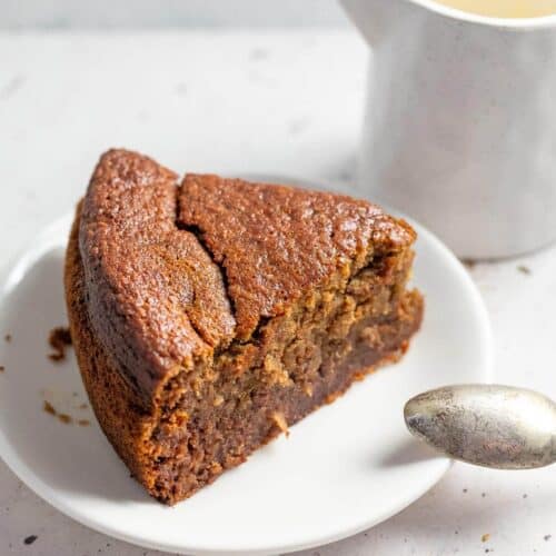 a slice of sticky date cake on a plate