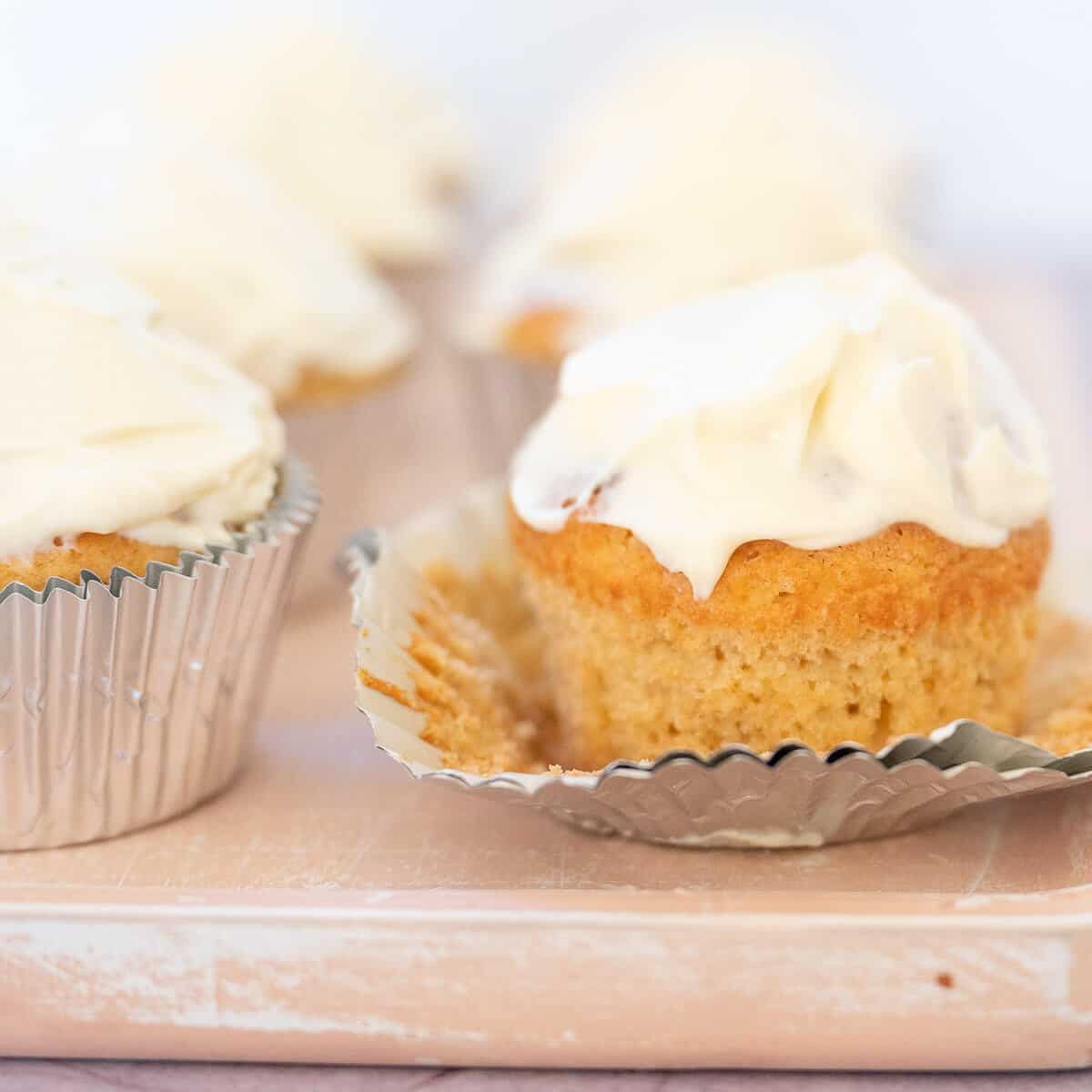 sugar free vanilla cupcake with the foil liner pulled down