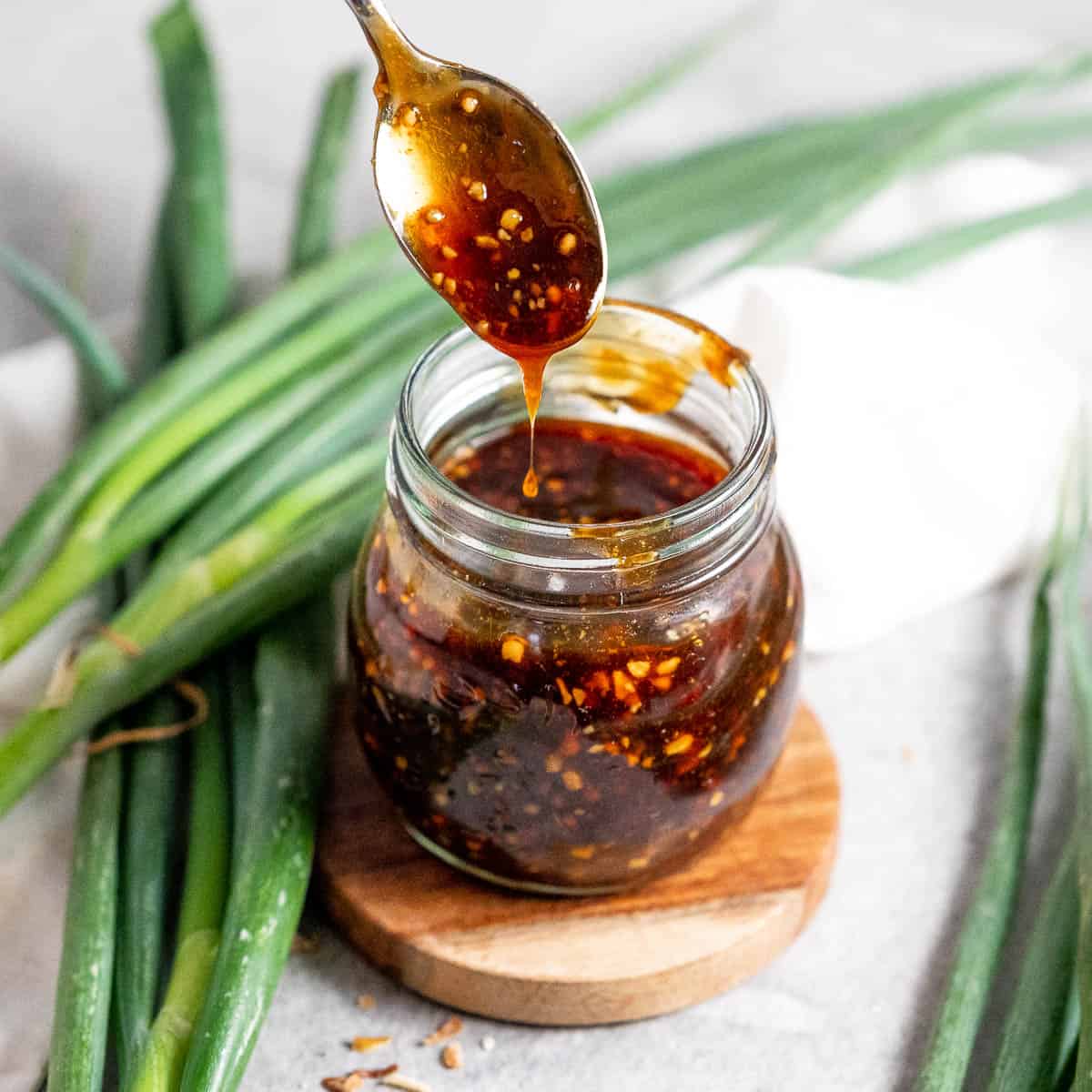 Sugar Free Teriyaki Sauce in a jar with spoon