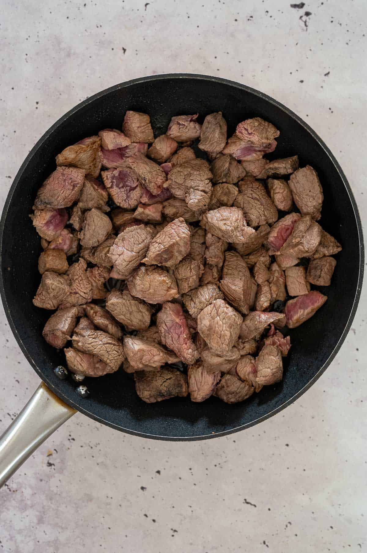 browning beef in a pan