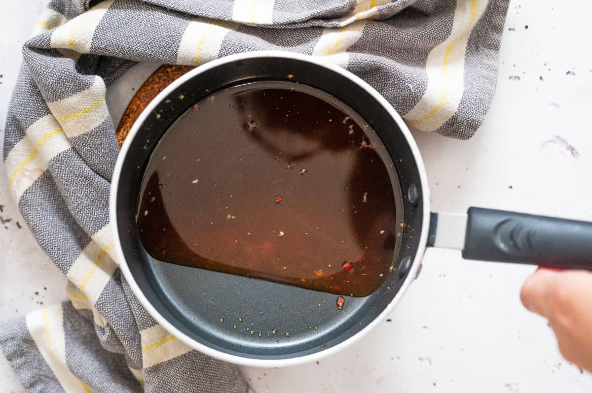 a pot of stir fry sauce after thickening