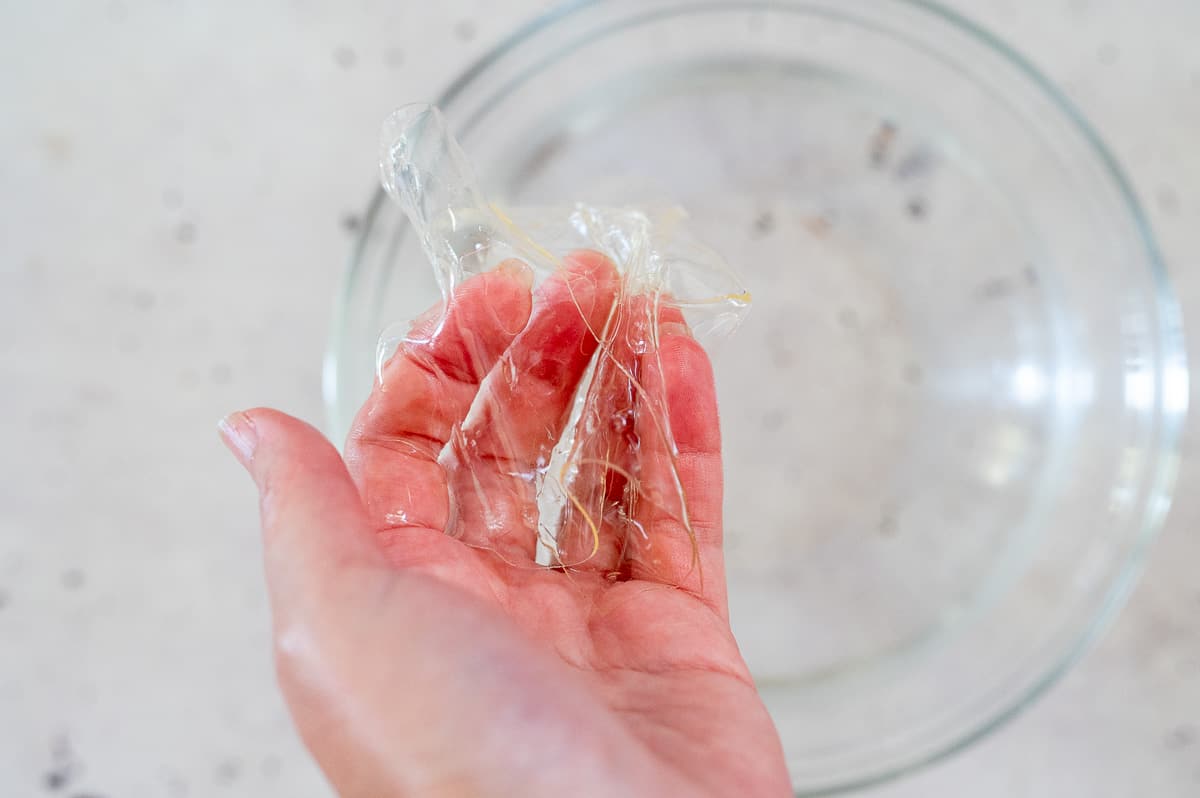 squeezing water from gelatine leaves