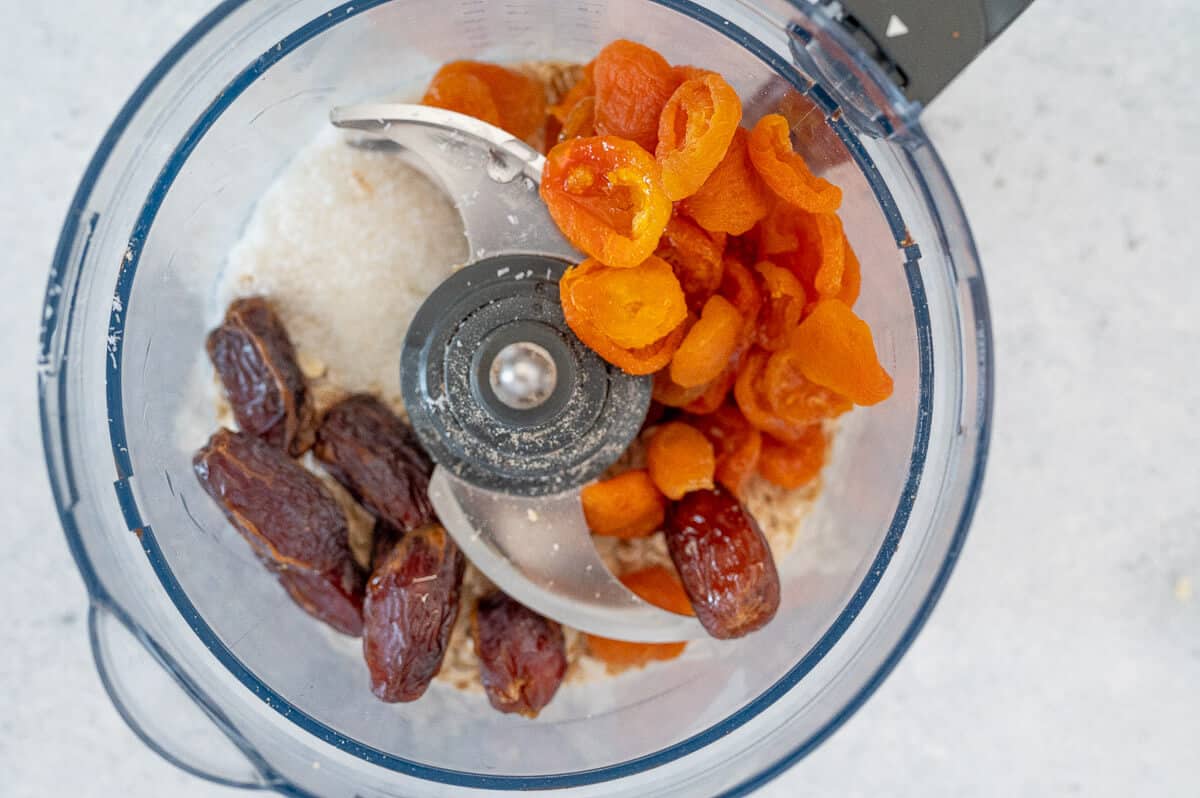 coconut, apricots and dates in a food processor