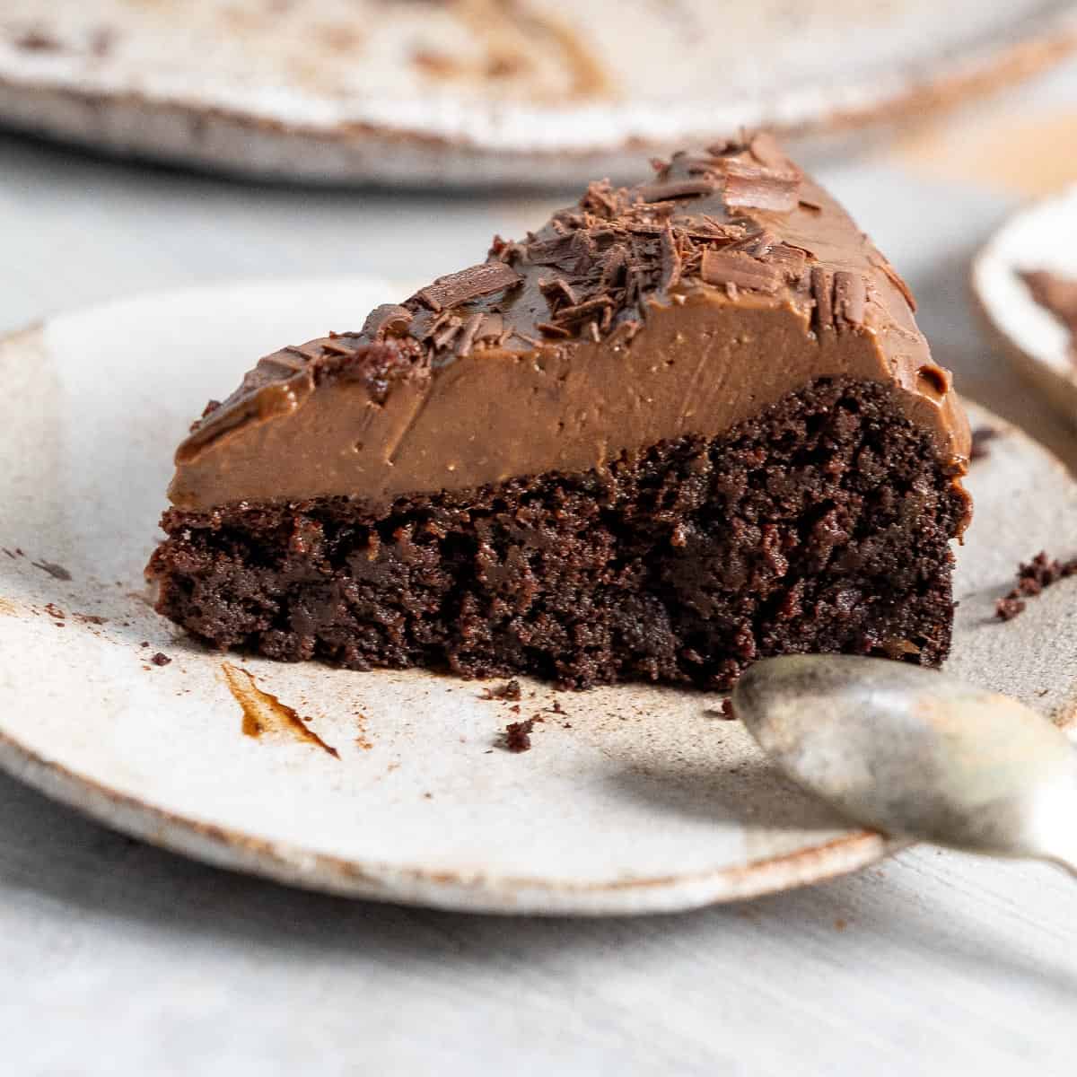 a slice of black bean chocolate cake on a plate