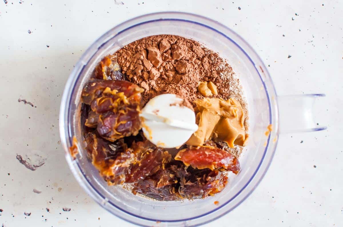 ingredients for date balls in a food processor